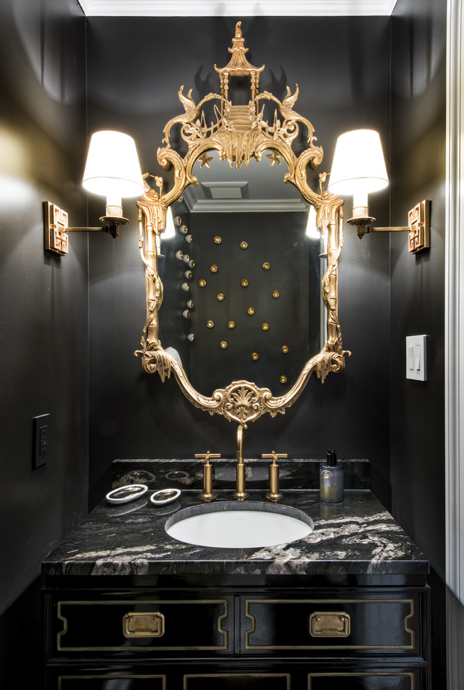 This is an example of a small traditional powder room in Louisville with an undermount sink, furniture-like cabinets, black cabinets, granite benchtops and black walls.
