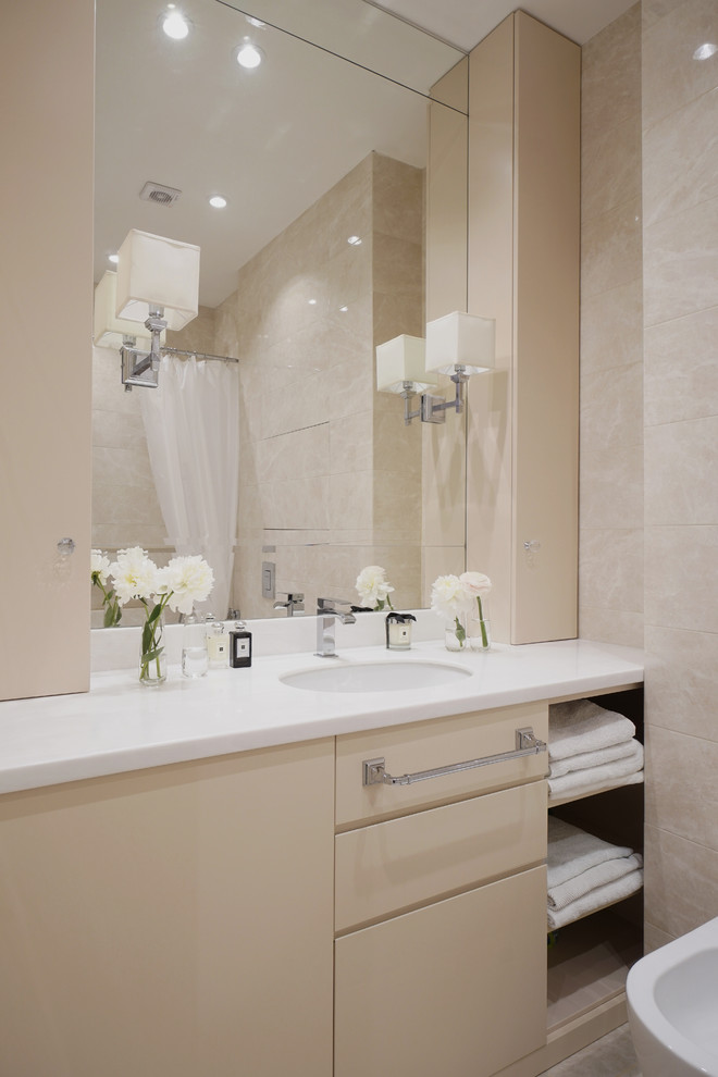 Photo of a small transitional 3/4 bathroom in Moscow with flat-panel cabinets, beige cabinets, a bidet, beige tile, ceramic tile, porcelain floors, an undermount sink, solid surface benchtops, beige floor, a shower curtain and white benchtops.