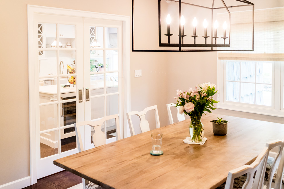 Dining room - mid-sized transitional dark wood floor and brown floor dining room idea in New York with beige walls