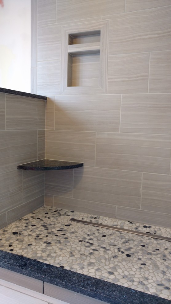 This is an example of a mid-sized traditional master bathroom in Other with an alcove shower, beige tile, porcelain tile, beige walls, pebble tile floors, granite benchtops, beige floor and an open shower.
