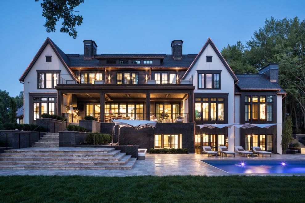 Large trendy privacy and mixed material railing balcony photo in Minneapolis with no cover