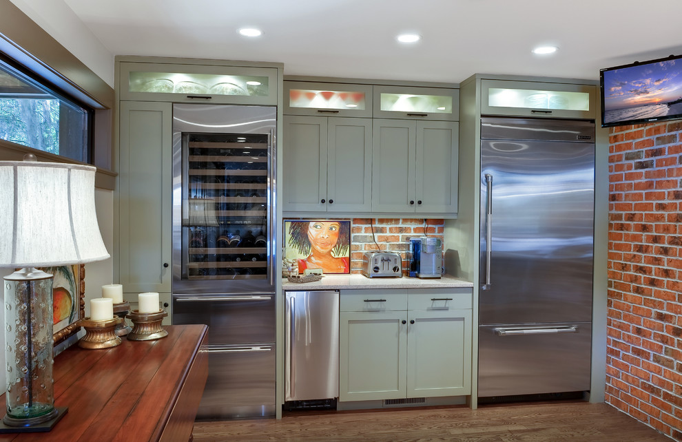 Design ideas for a mid-sized transitional single-wall wet bar in Charleston with grey cabinets, quartz benchtops, shaker cabinets, red splashback and medium hardwood floors.