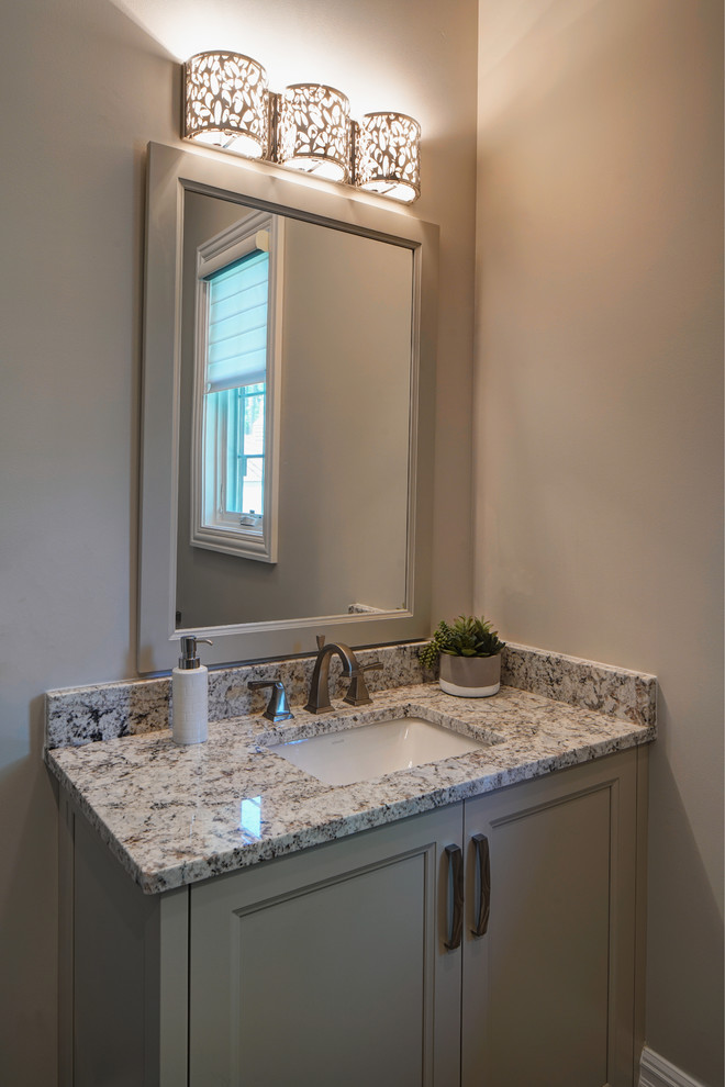 Photo of a mid-sized transitional kids bathroom in Chicago with flat-panel cabinets, grey cabinets, white tile, grey walls, porcelain floors, an undermount sink, granite benchtops, white floor and grey benchtops.
