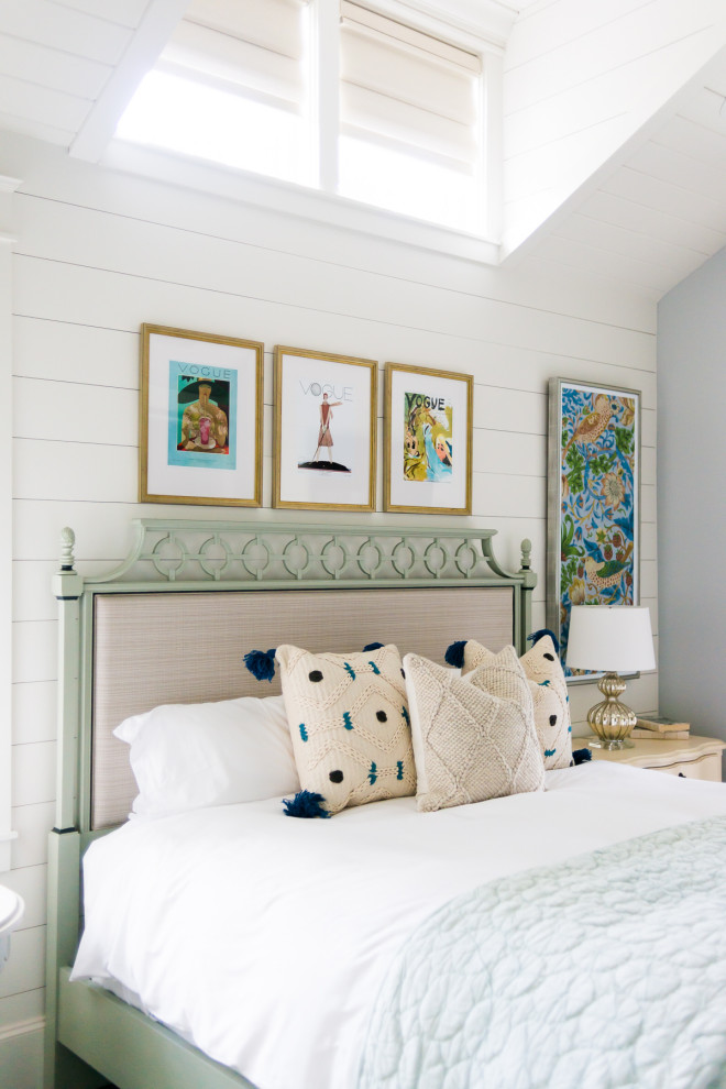 Bluejack National Sunday Home I - This dreamy bedroom is designed to inspire and delight with its captivating blue color palette, whimsical art, and charming details. 

The bedroom walls are adorned with colorful art, adding a touch of creativity and playfulness to the space.
