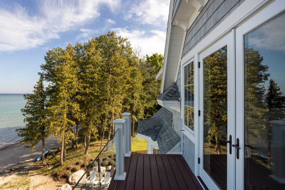 Inspiration for a small timeless glass railing balcony remodel with no cover