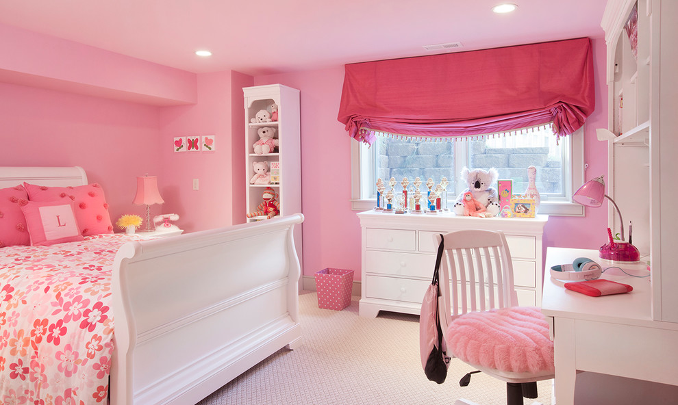 Traditional kids' room in Omaha with pink walls.