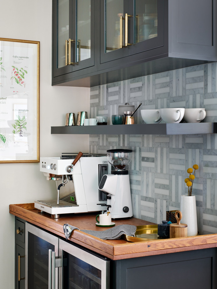 Home bar - mid-sized transitional galley medium tone wood floor and brown floor home bar idea in Chicago with an undermount sink, recessed-panel cabinets, green cabinets, granite countertops, white backsplash, subway tile backsplash and white countertops