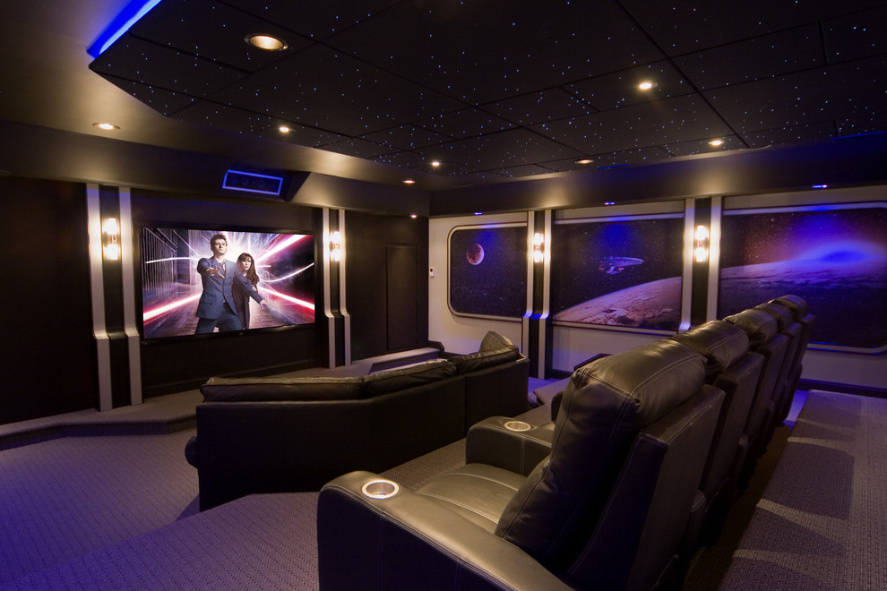 This is an example of a contemporary enclosed home theatre in DC Metro with purple floor.