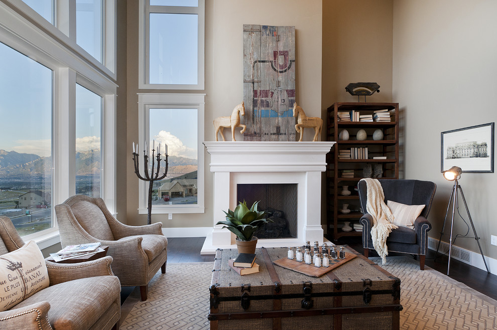 Traditional family room in Salt Lake City with a wood fireplace surround.