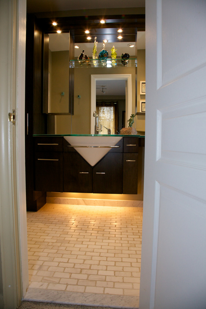 Photo of a small modern 3/4 bathroom in Toronto with flat-panel cabinets, dark wood cabinets, brown walls, brick floors, an undermount sink, glass benchtops, white floor and green benchtops.
