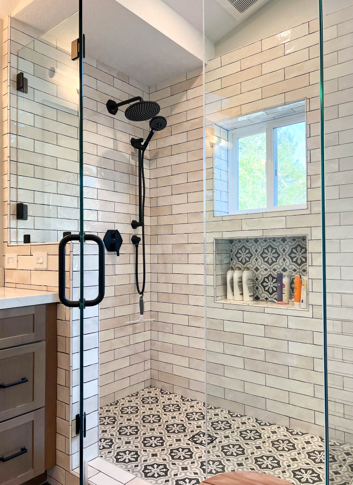 This is an example of a large mediterranean bathroom in Orange County with shaker cabinets, medium wood cabinets, a corner shower, white tile, ceramic tile, white walls, engineered quartz benchtops, a hinged shower door, white benchtops, a double vanity and a built-in vanity.