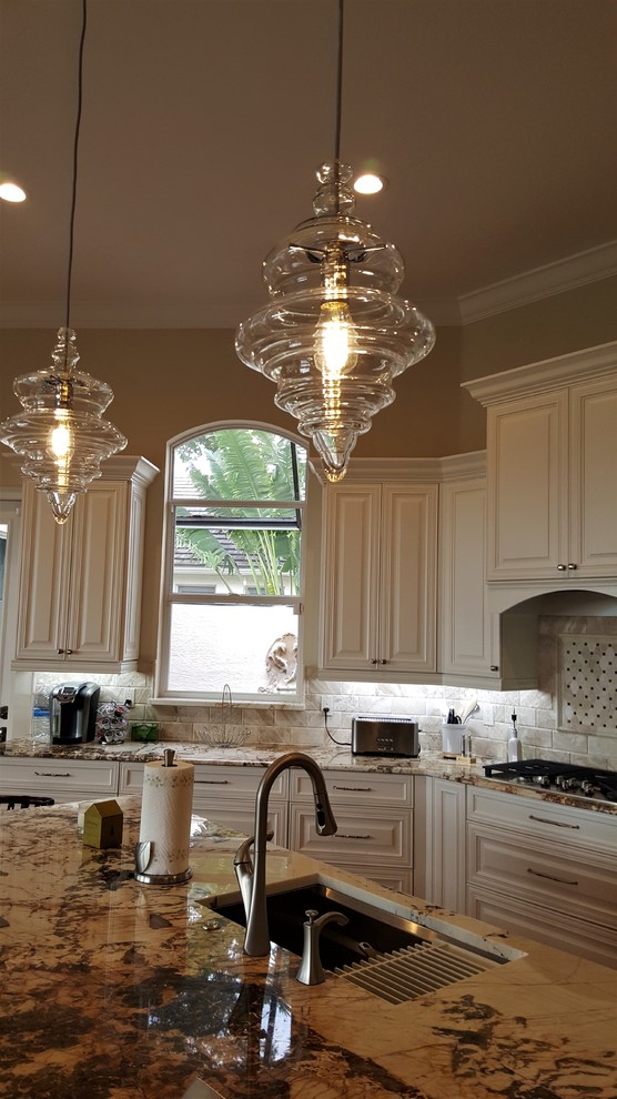 Example of a transitional kitchen design in Miami