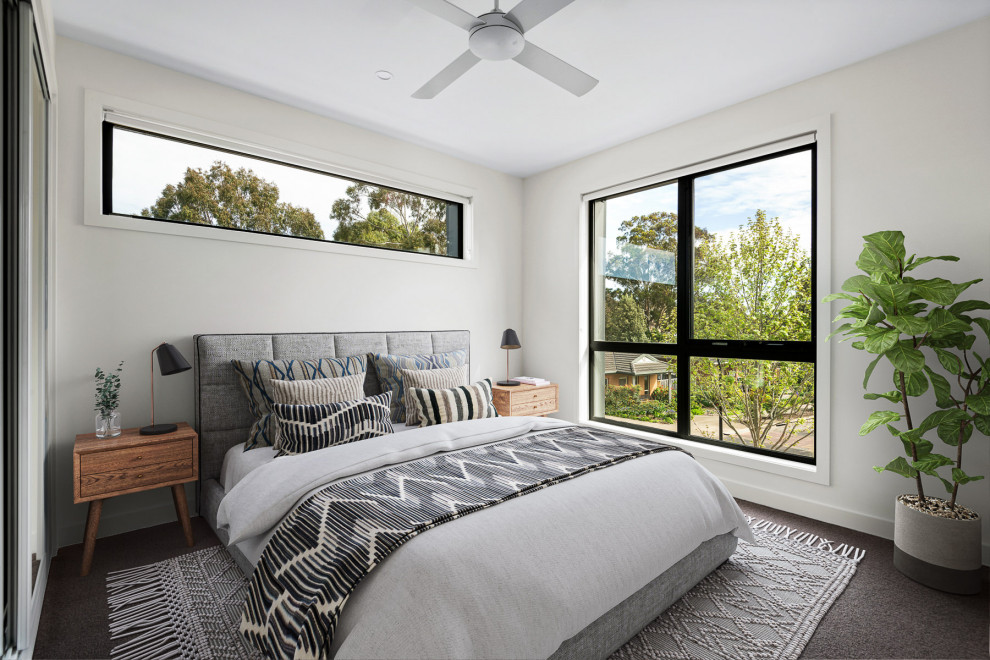This is an example of a contemporary bedroom in Geelong.