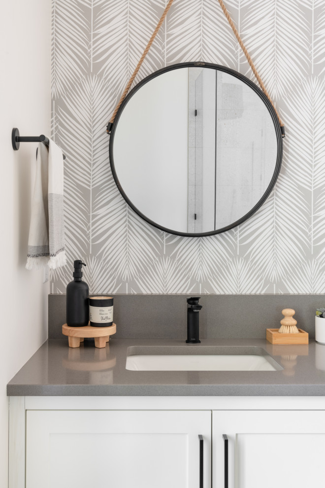 Example of a beach style powder room design in Vancouver