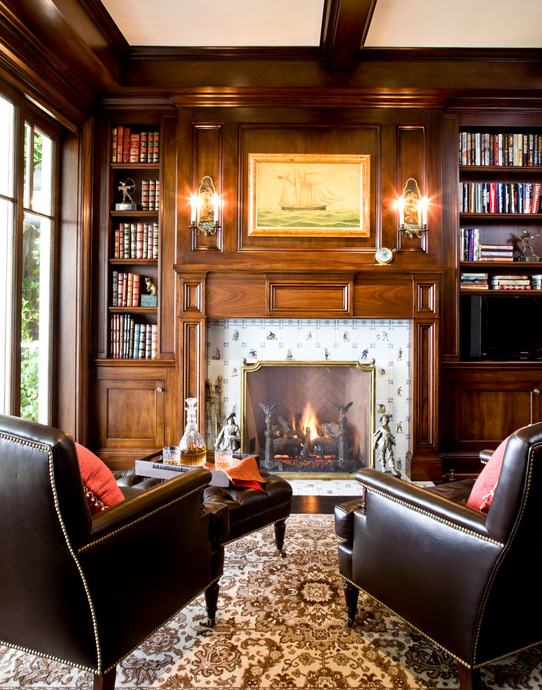 Photo of a traditional home office in Los Angeles with a tile fireplace surround.
