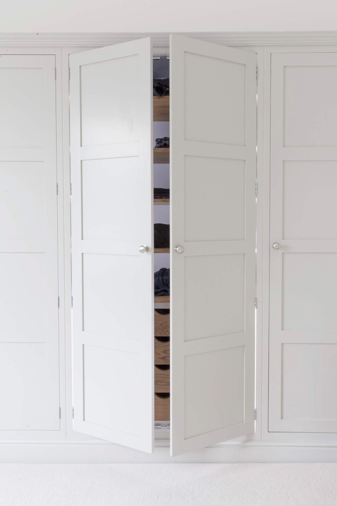 Inspiration for a modern storage and wardrobe in Gloucestershire with shaker cabinets.