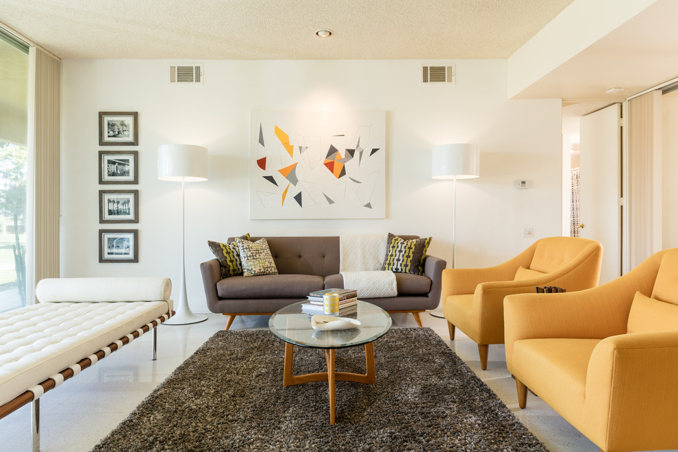 Design ideas for a midcentury living room in San Luis Obispo with white walls.