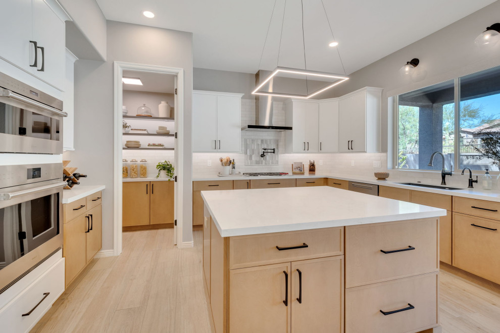 Example of a transitional kitchen design in Phoenix