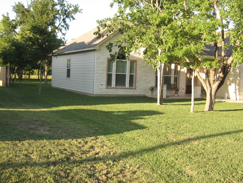 Building with railroad ties house