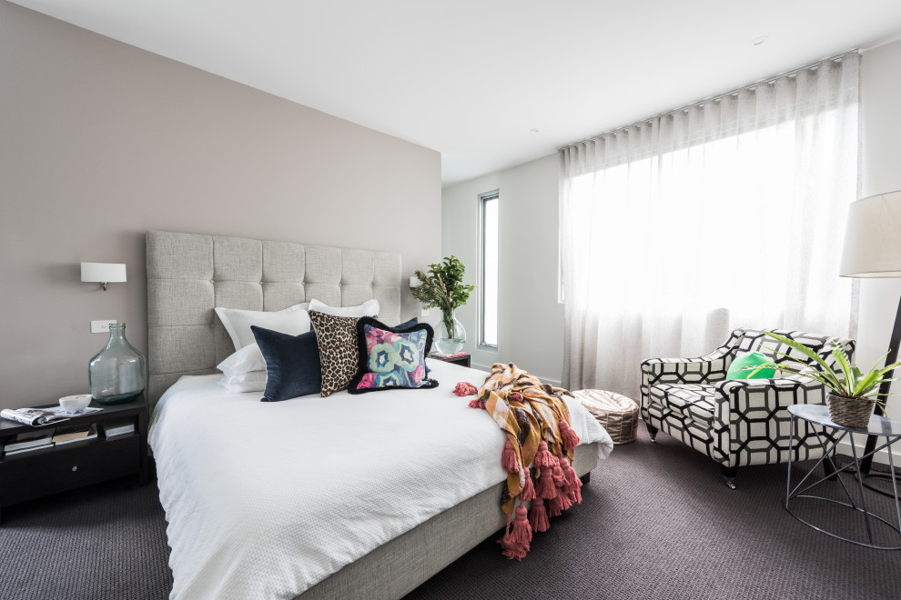 Photo of a contemporary bedroom in Melbourne with grey walls, carpet and grey floor.