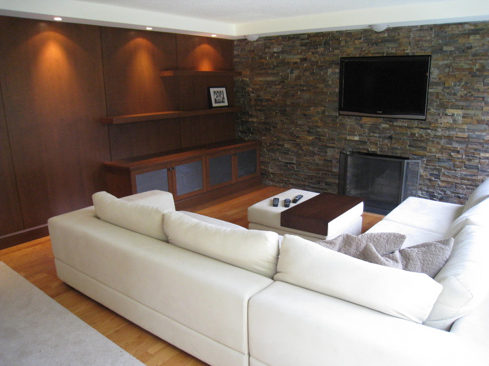 Photo of a contemporary family room in Montreal.