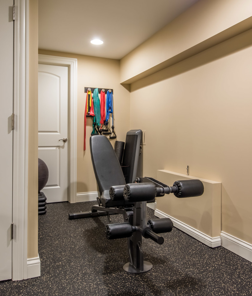 Design ideas for a transitional home gym in Chicago.