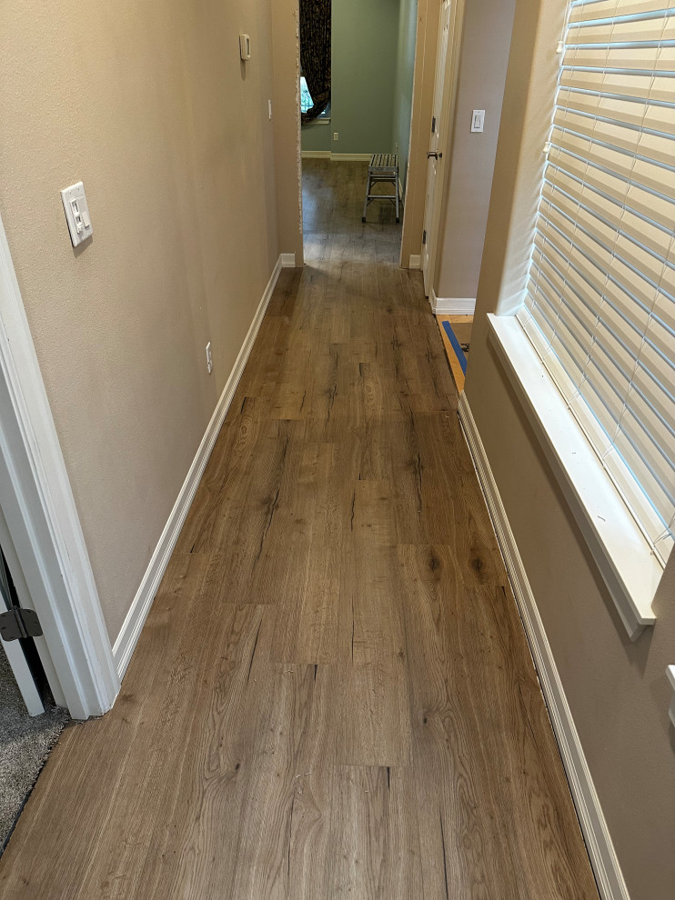 ADA Bathroom/Garage Retrofit and New Flooring