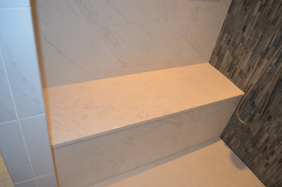 Example of a transitional home design design in Boston