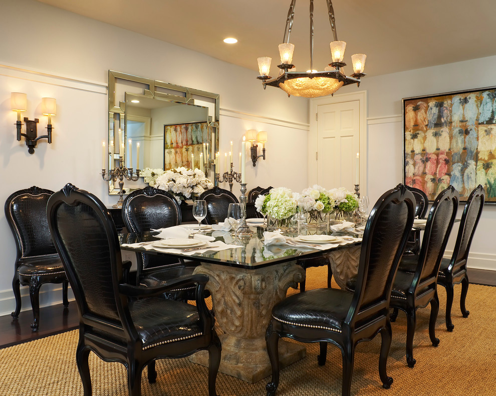 Design ideas for a traditional separate dining room in Miami with grey walls and dark hardwood floors.