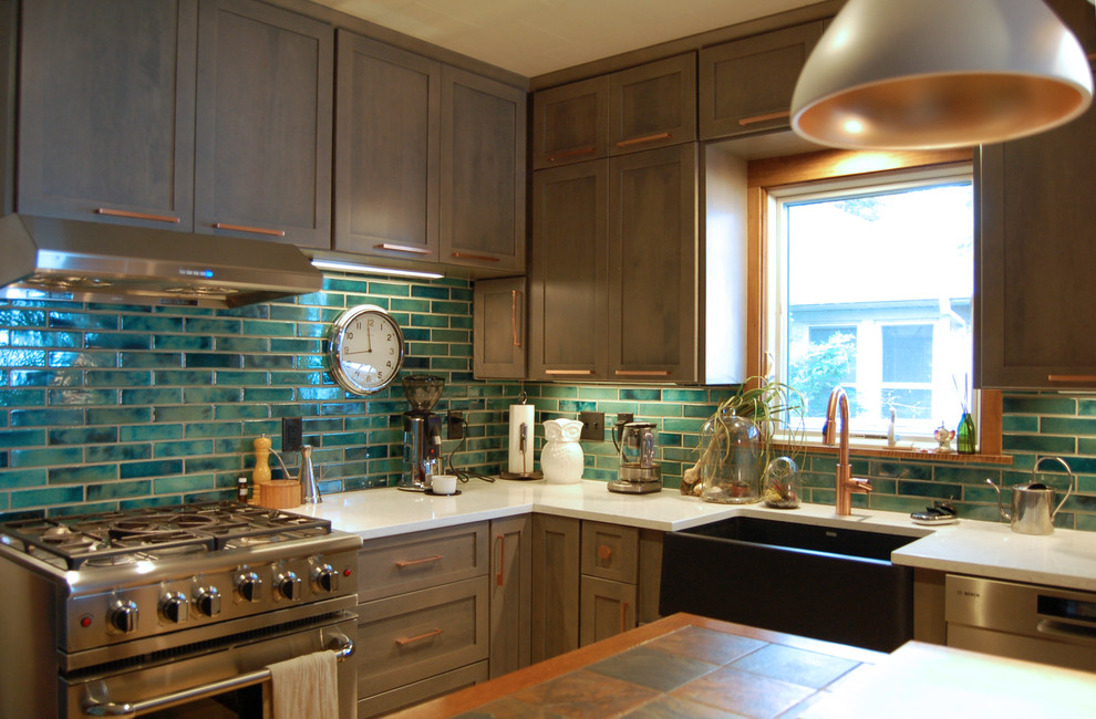 Inspiration for a transitional l-shaped light wood floor and multicolored floor open concept kitchen remodel with a farmhouse sink, shaker cabinets, gray cabinets, quartzite countertops, blue backsplash, ceramic backsplash, stainless steel appliances and an island