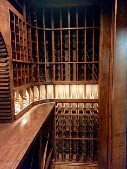 Design ideas for a small traditional wine cellar in Atlanta with storage racks.