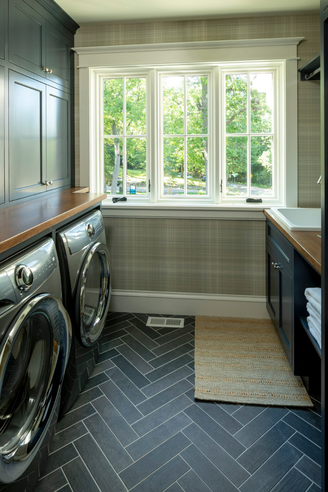 Example of a small beach style u-shaped ceramic tile dedicated laundry room design in Minneapolis with beaded inset cabinets, gray cabinets and wood countertops