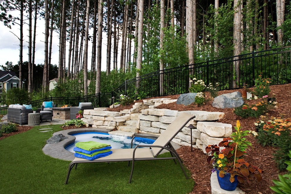 Large modern backyard xeriscape in Minneapolis for summer.