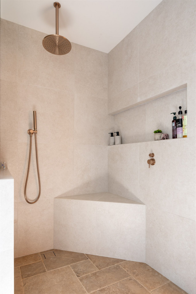 Scandinavian ensuite bathroom in Wollongong with beige cabinets, grey tiles, cement tiles, tiled worktops, brown floors, grey worktops and double sinks.