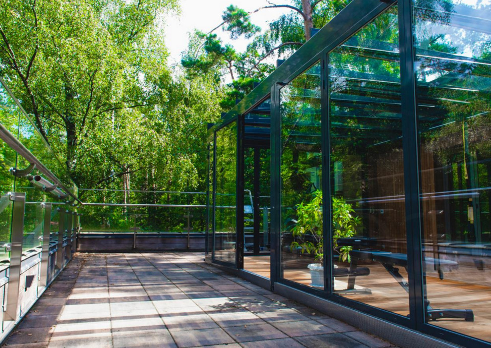 Стеклянная веранда на эксплуатируемой кровле