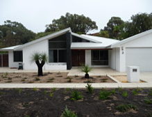 This is an example of a beach style home design in Perth.