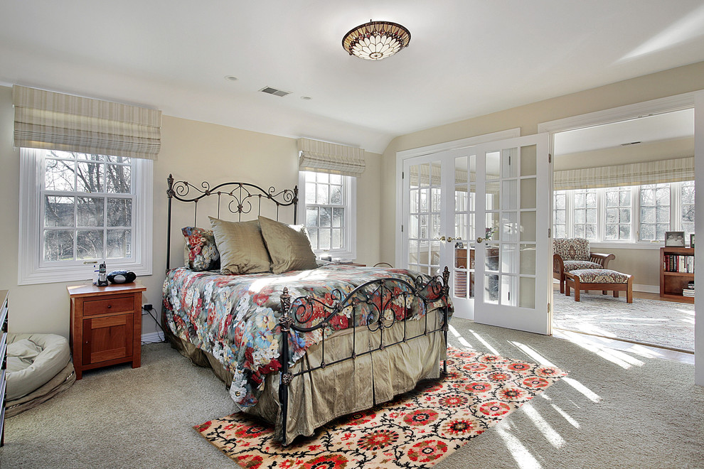 Mid-sized elegant master carpeted and gray floor bedroom photo in DC Metro with beige walls