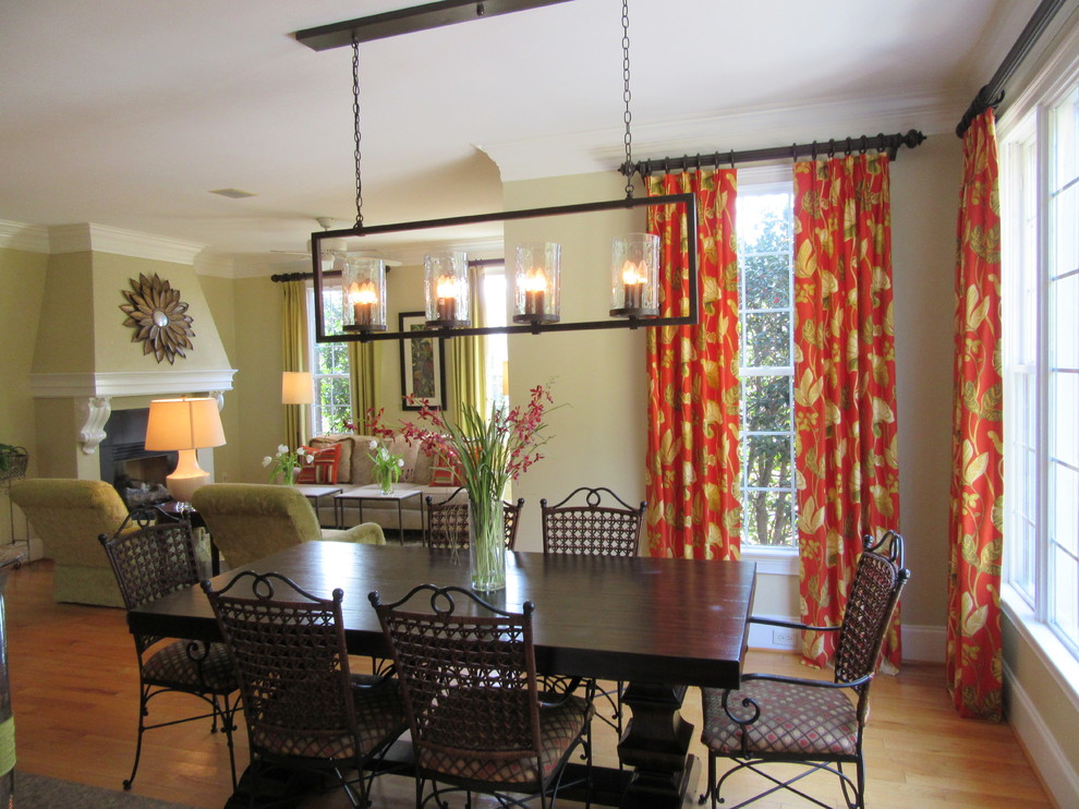 Inspiration for a mid-sized transitional medium tone wood floor and beige floor great room remodel with beige walls and no fireplace