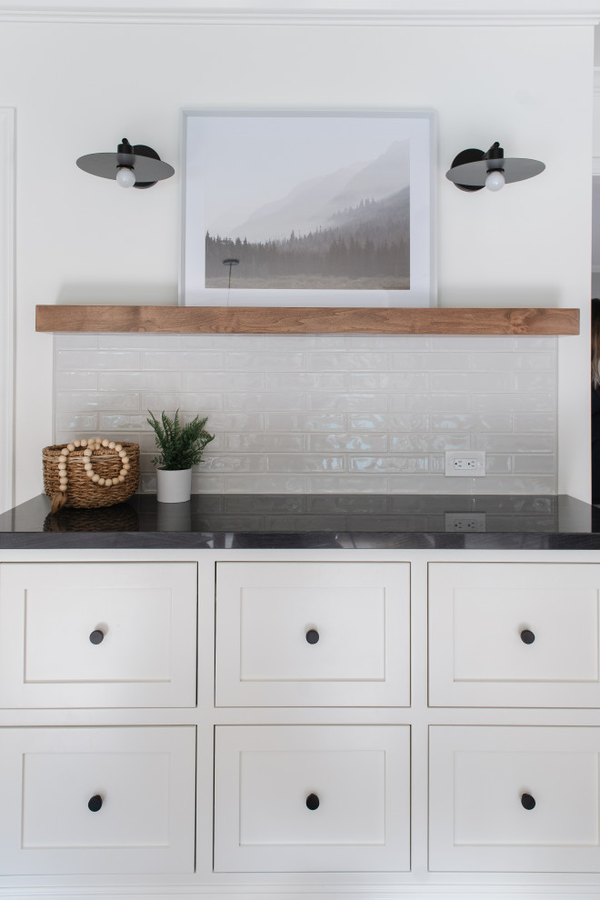 Inspiration for a large modern kitchen in Sacramento with shaker cabinets, white cabinets, quartz benchtops, stainless steel appliances, medium hardwood floors and with island.