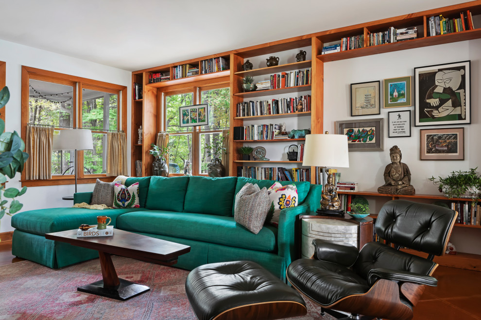 This is an example of an eclectic living room in Raleigh.