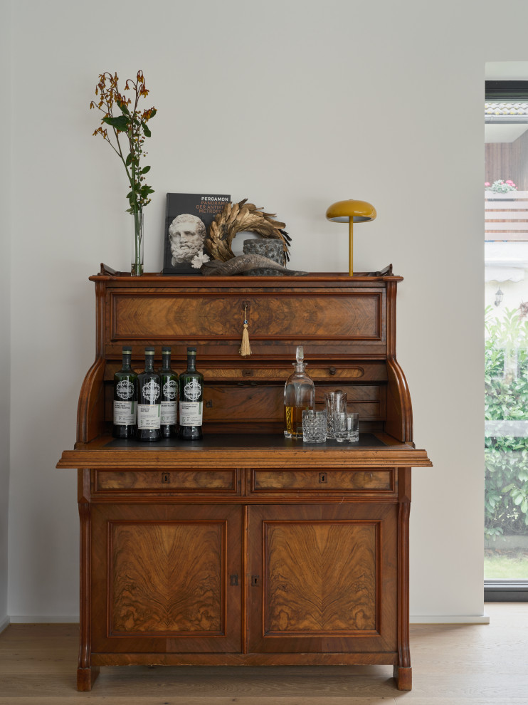 ECO BERLIN THREE LEVEL REMODEL Modern Home Bar Berlin by Raini