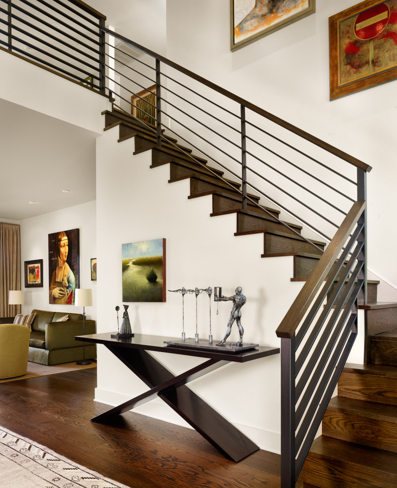 Mid-sized eclectic wood l-shaped staircase in Austin with wood risers and cable railing.