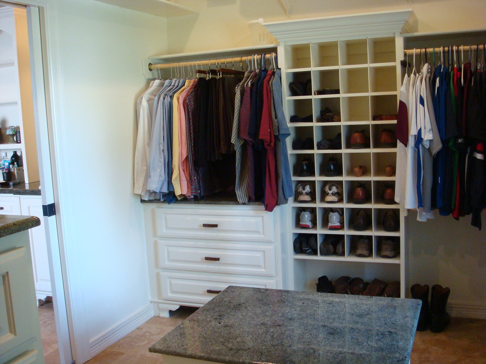 This is an example of a traditional storage and wardrobe in Houston.