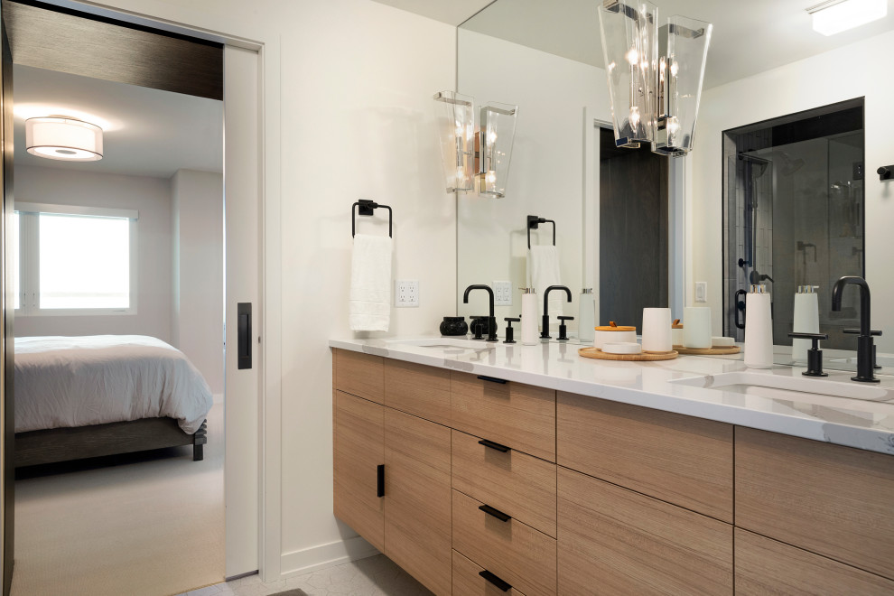 Inspiration for a contemporary master double-sink bathroom remodel in Minneapolis with flat-panel cabinets, brown cabinets, white walls, an undermount sink, white countertops and a floating vanity