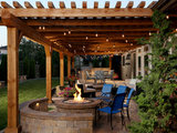 Rustic Patio by Yardscapes Northwest
