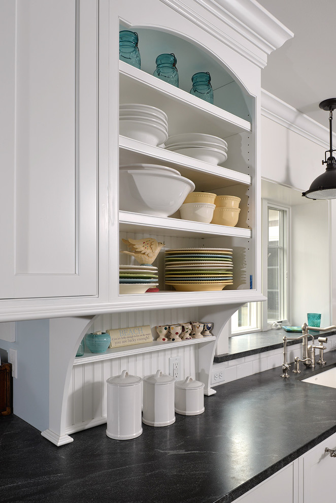 Inspiration for a large transitional ceramic tile eat-in kitchen remodel in Atlanta with furniture-like cabinets, white cabinets, granite countertops, gray backsplash, stainless steel appliances, white walls and an island