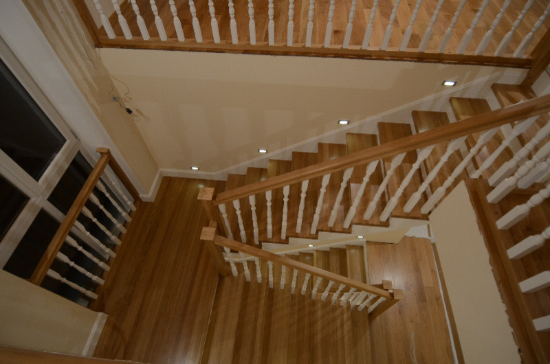 Wood cladding of a concrete stair