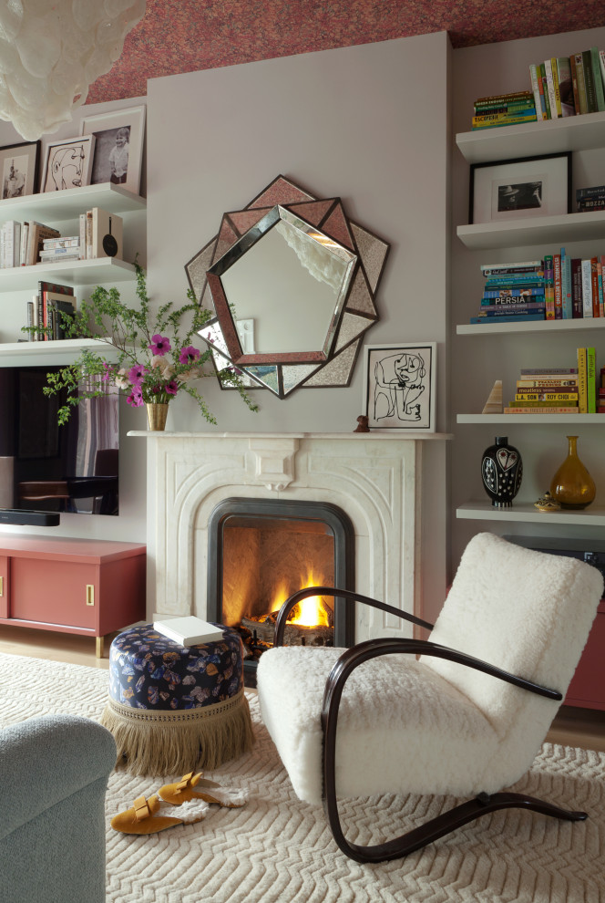 Mid-sized contemporary enclosed living room in New York with white walls, carpet, a standard fireplace, a stone fireplace surround, white floor and wallpaper.