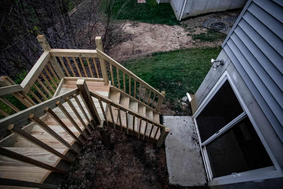 Medium sized traditional back ground level wood railing terrace in Cincinnati.