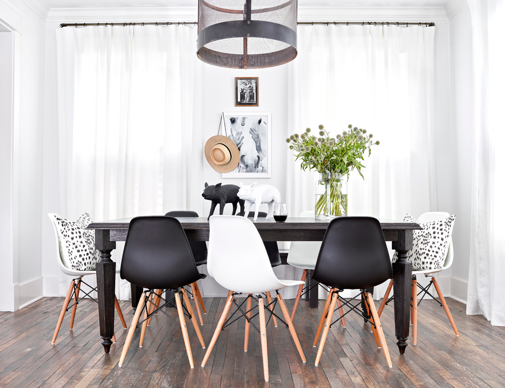 Photo of a transitional dining room in Nashville with white walls and dark hardwood floors.
